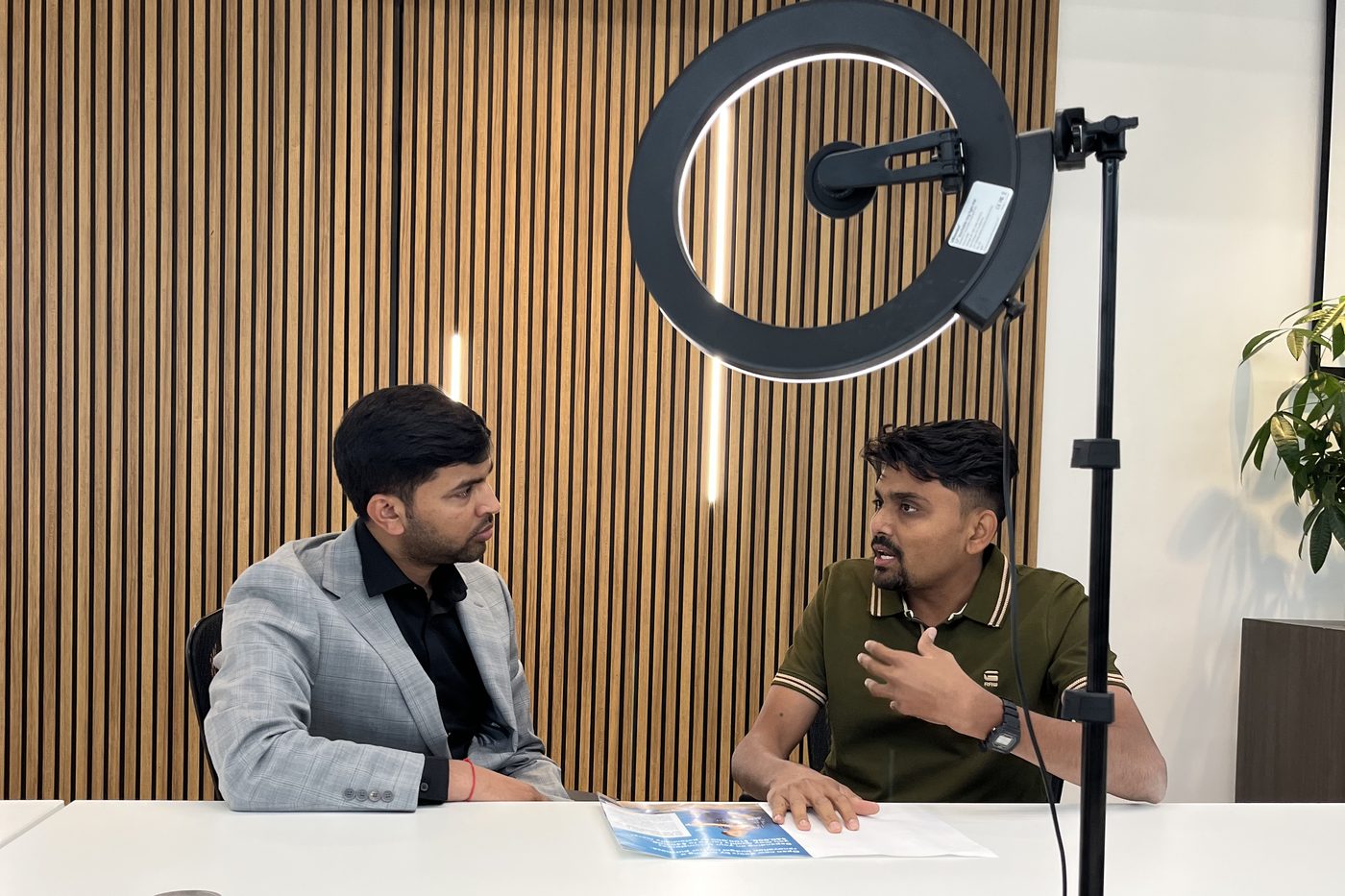 A NexAura shoot in progress, ring light set up for a client interview