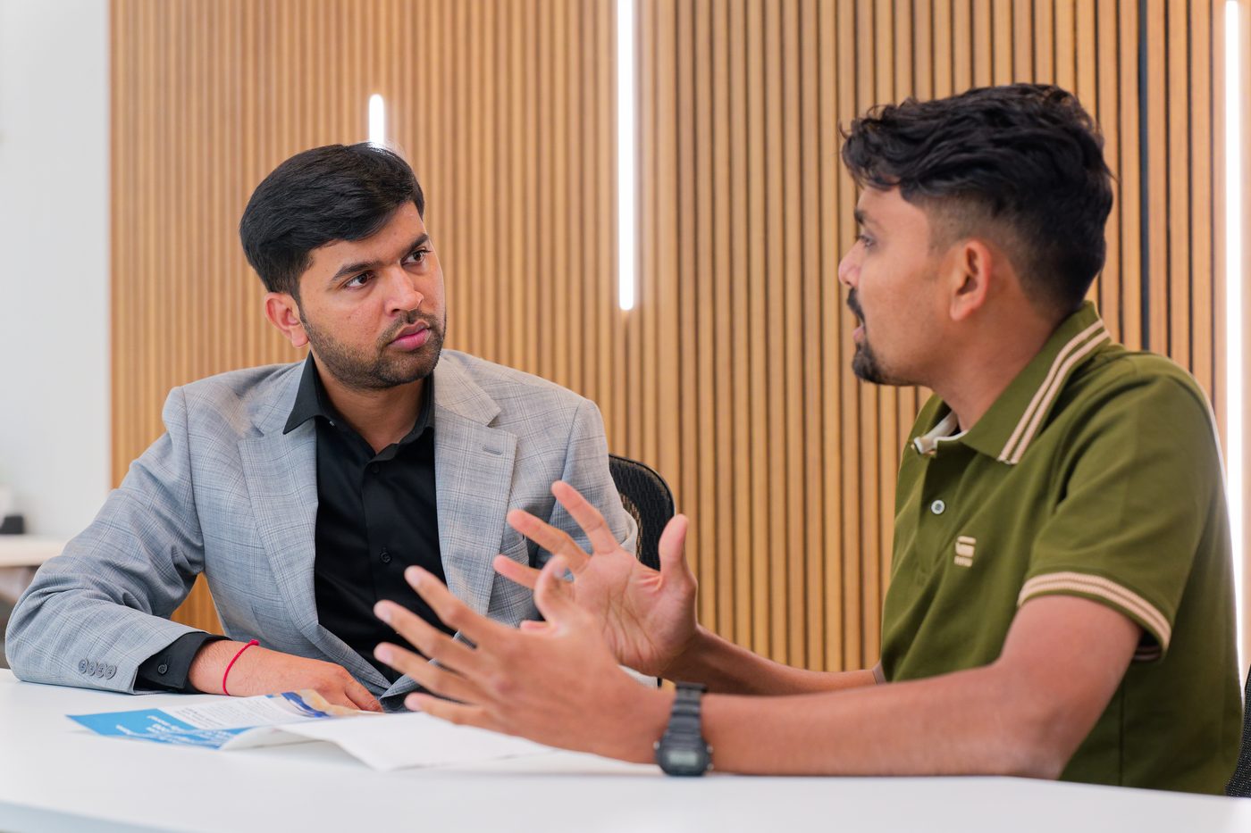 Kaushik Patel in a client meeting with a NexAura founder