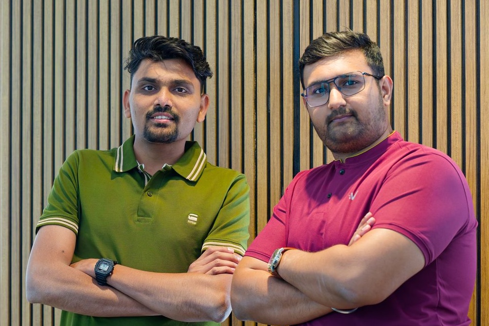 Both NexAura founders standing side by side